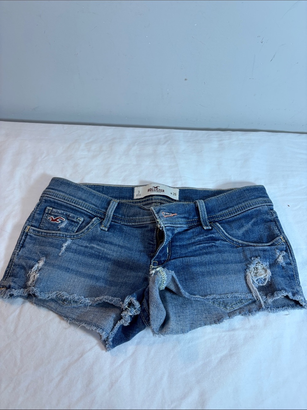 Hollister Women's Frayed Distressed Denim Shorts - Medium Blue. 0204